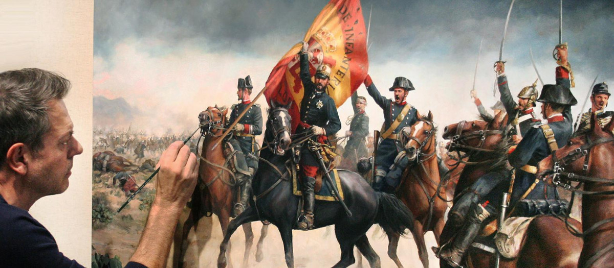 Retrato de ferrer dalmau mirando un cuadro propio.